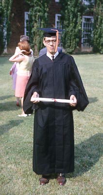 1965 Doc Holds Diploma, photo credit unknown.